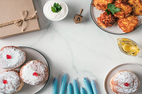 This is a stock photo. A celebratory Hanukkah table.