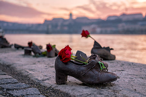 This is a stock photo. The shoes on Danube Bank are a Holocaust memorial to honor the Jews who were killed in Budapest, Hungary during World War II.